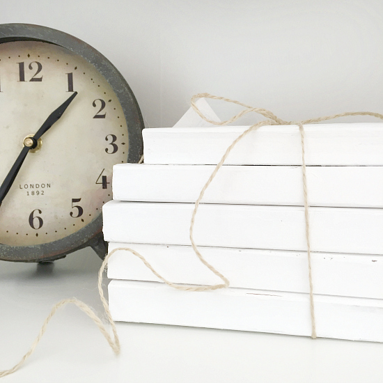 Books from Goodwill painted, stacked and tied with twine. Used in office as decor