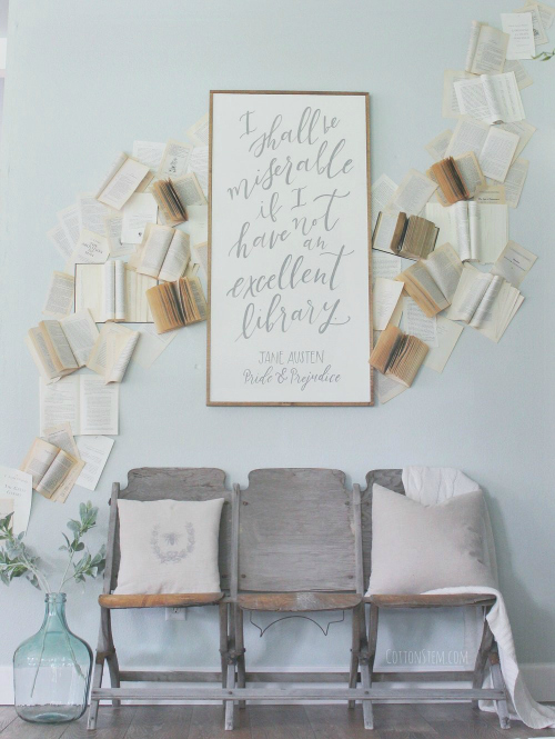 Book wall created by nailing old books in a pattern to the wall