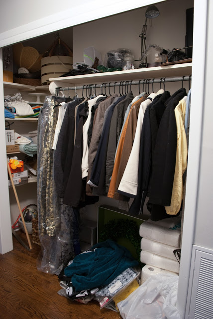 Coat closet before $100 Room Challenge