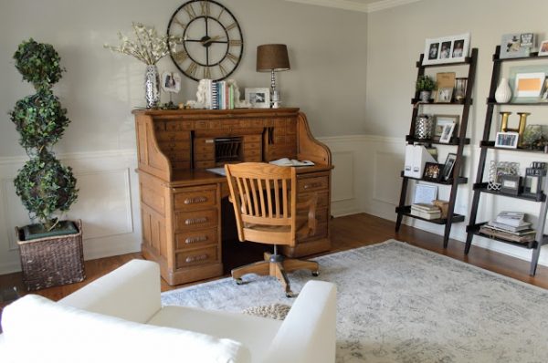 Dining Room turned office with a $100 makeover. Displaying desk and open ladder shelving.