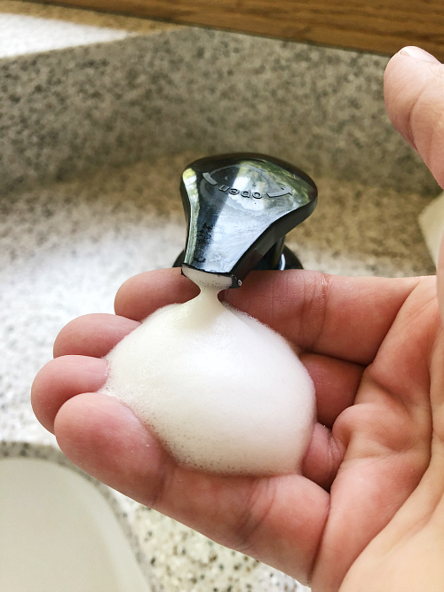 Lathered soap from foaming hand soap dispenser