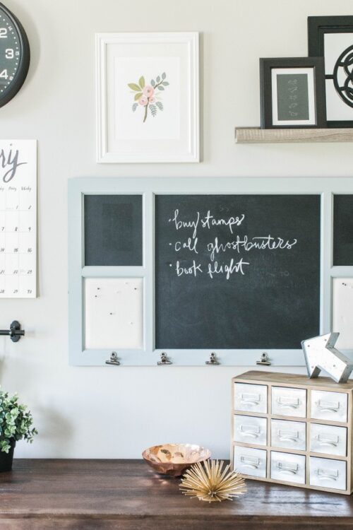 This command center idea comes from The Small Things and features a chalkboard with small clips and a paper calendar. Below the command center is a small card catalog style display which could serve to hold various items.