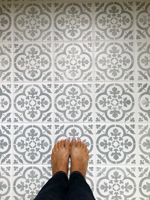 Finished stenciled tile floor