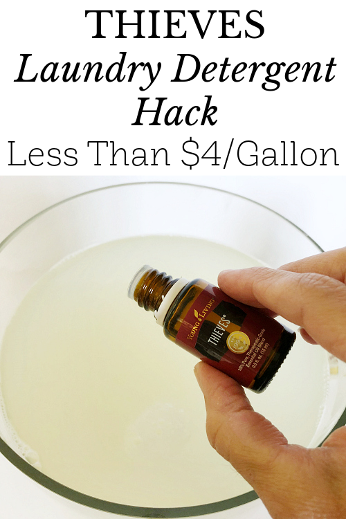Adding Thieves essential oil to DIY Thieves Laundry Soap