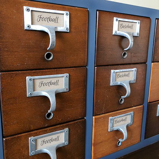 Card catalog drawers labeled for football and baseball card organization