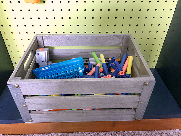 Nerf Gun Bullets and Accessories in a wooden crate