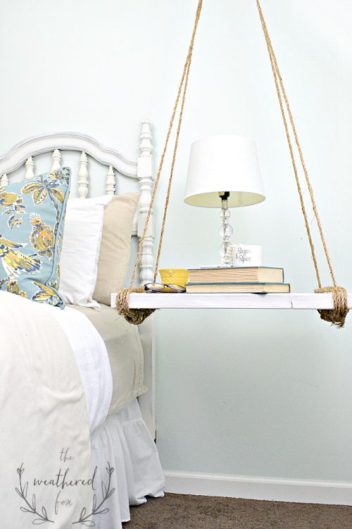 Hanging distressed wood shelf nightstand hung from ceiling with rope