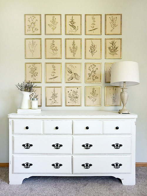 Dresser painted in Fusion Mineral Paint in the color Raw Silk with gallery wall above it.