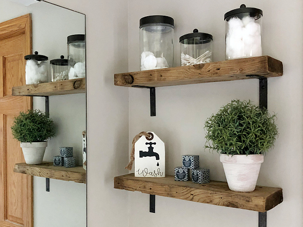 DIY Weathered Wood Shelves Styled in Bathroom show idea for how to design on a budget