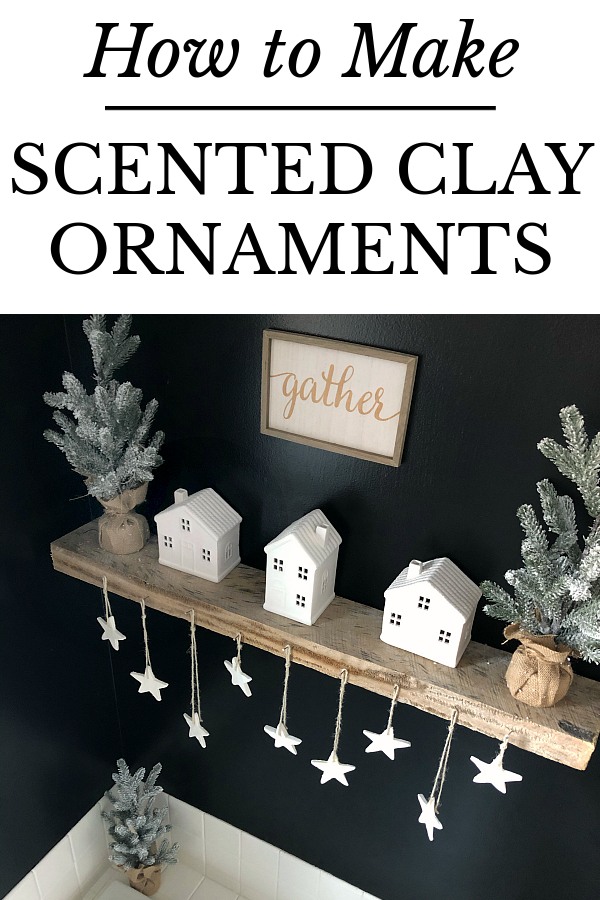 A garland of homemade clay ornament stars hanging above bathtub