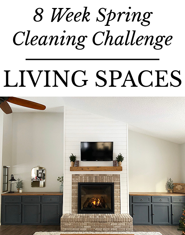 Living room with view of fireplace and deep blue cabinets
