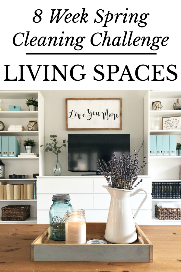 View of Living Room with white cabinets and bookshelves