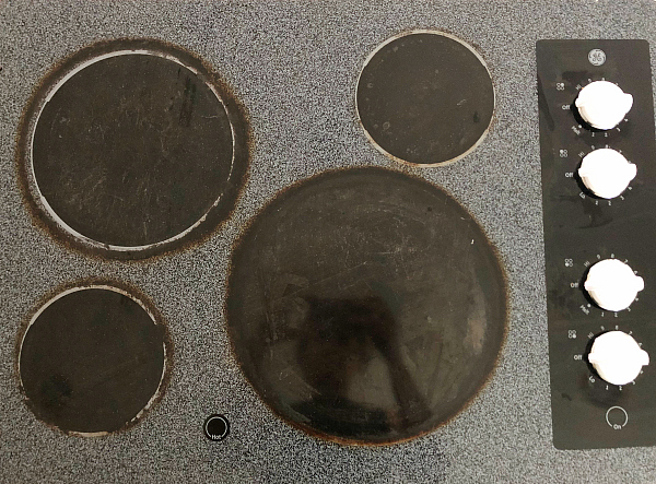 Glass stovetop before cleaning