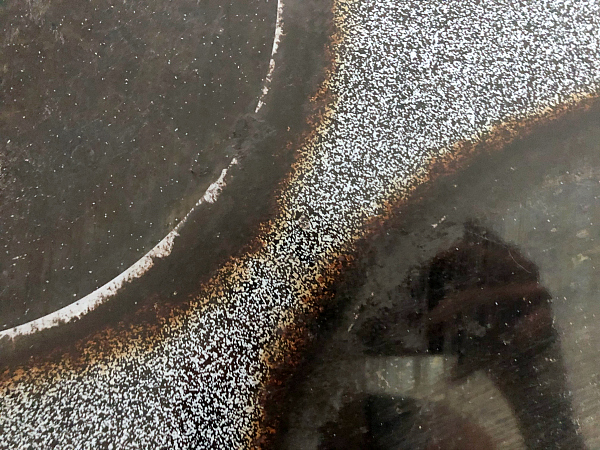 Large glass stove top burners with burnt-on stains