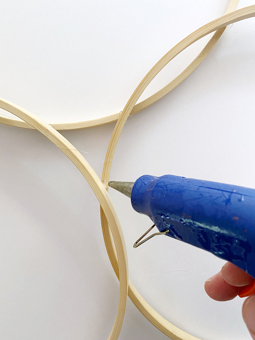 Using hot glue to secure hoops together