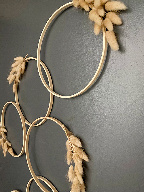 Finished Door Decor with embroidery hoops and wheat stems