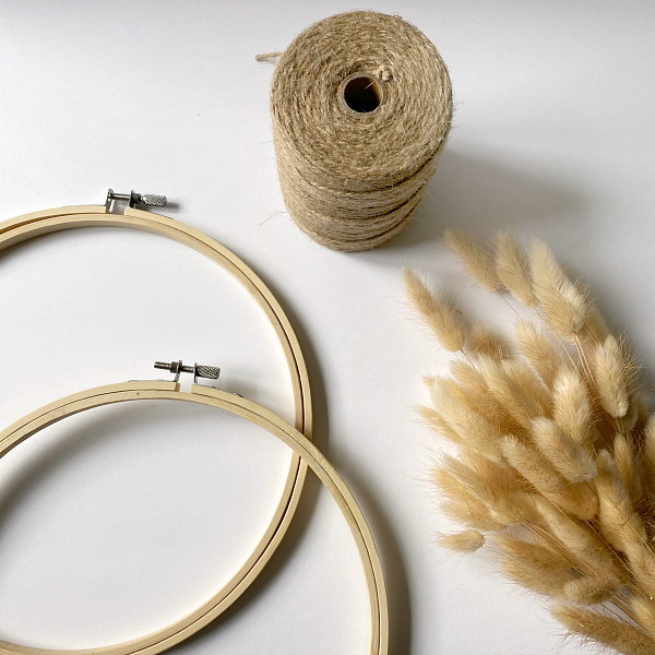 Supplies needed to create DIY Door Decor: Embroidery Hoops, Wheat Stems, Twine