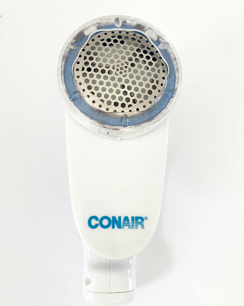 The easiest way to remove pilling from clothing and fabrics is this Conair Fabric Shaver.