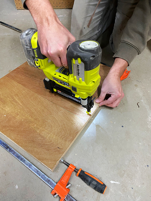 Attaching underlayment to back of Shaker Door Frame using a nail gun