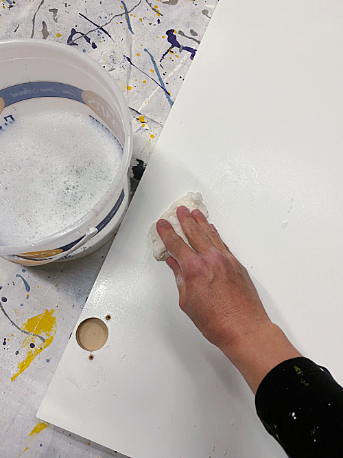 Cleaning Cabinets with soap and water prior to painting