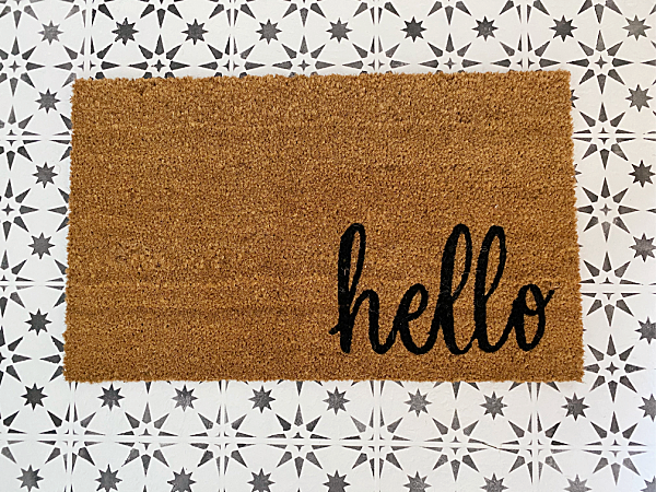 Stenciled Floor with Hello Welcome Mat in Laundry Room