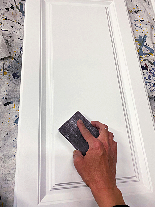 Use a high grit sanding block after each coat of primer and paint to ensure a smooth surface.