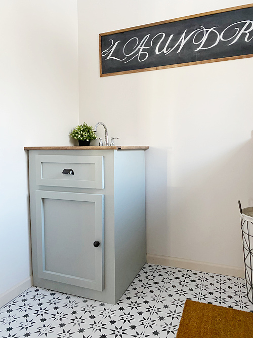 Utility Sink Hidden with Faux Vanity in $100 Laundry Room Makeover