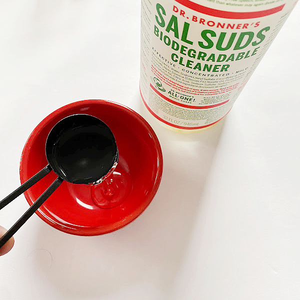 Adding Sal Suds to small bowl in order to make DIY Floor Cleaner