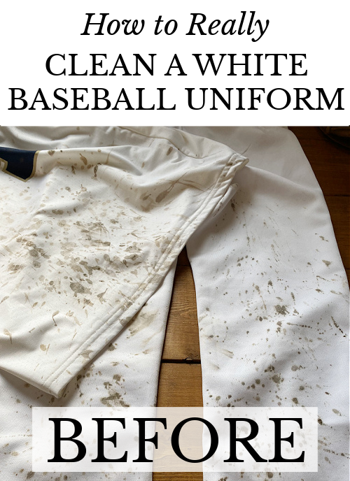 White baseball pants and shirt splattered in mud prior to cleaning