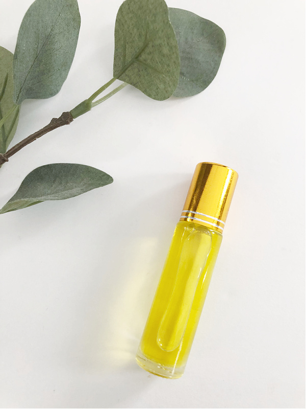 Homemade cuticle oil in a glass roller bottle