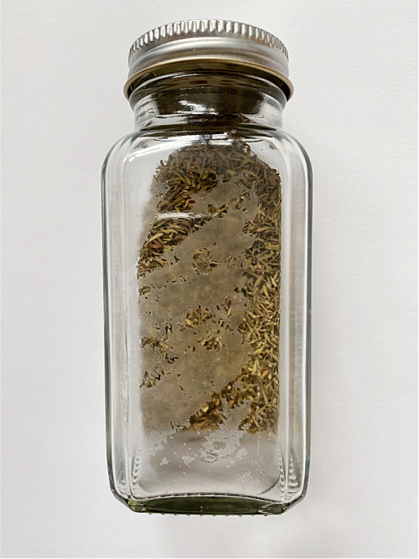 Spice Jar with sticky adhesive after removing label