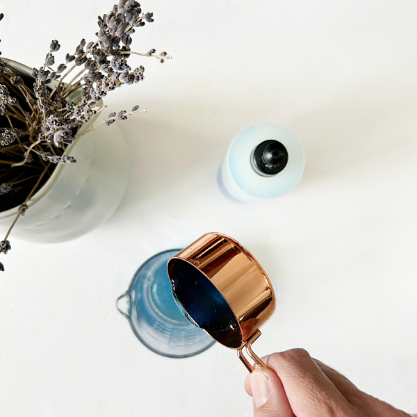 Adding dish soap to homemade stain remover