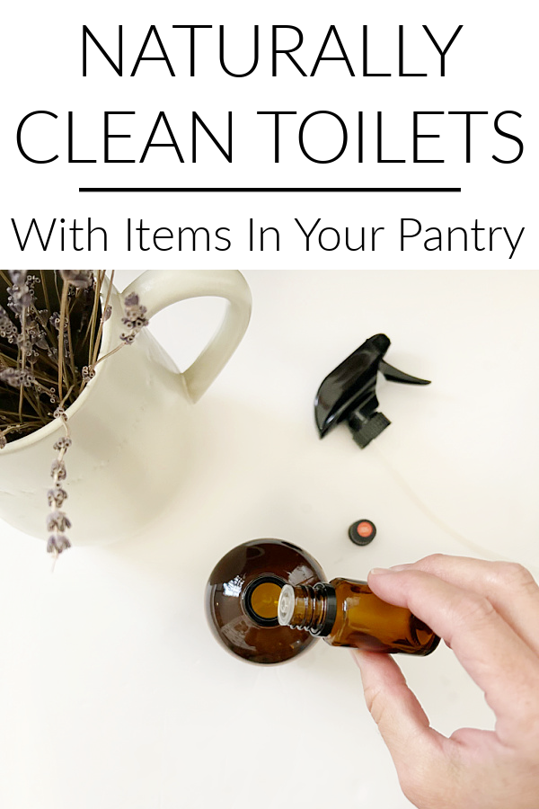Adding essential oil to a spray bottle of vinegar in order to clean toilets