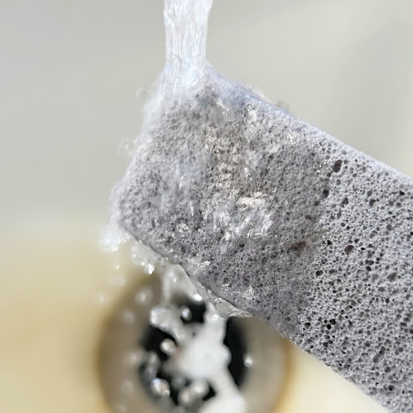 Wetting pumice stone