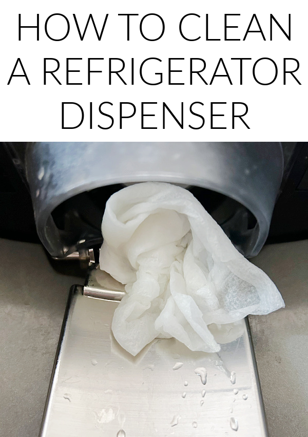 Vinegar soaked paper towel wrapped around a refrigerator dispenser