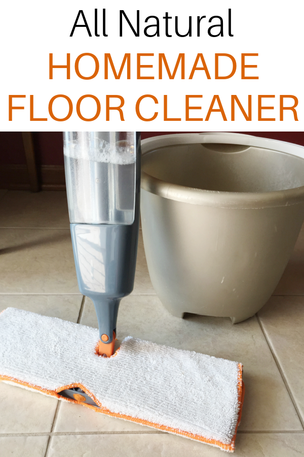 Mop and bucket on a tile floor