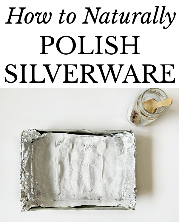 Silverware in aluminum foil lined pan, covered in baking soda