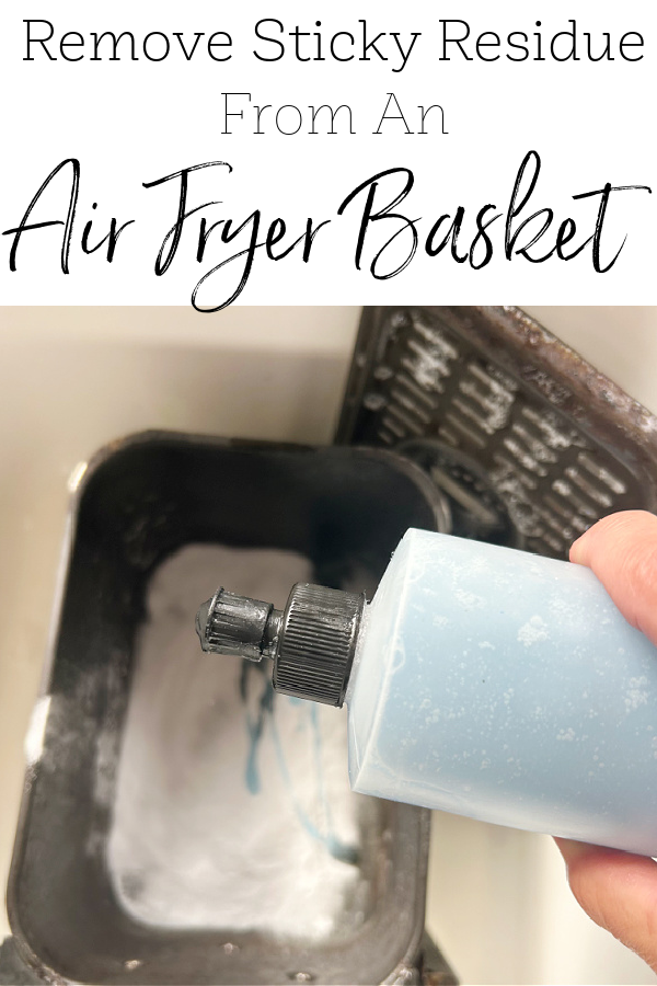 Adding dish soap to an air fryer basket to remove sticky residue