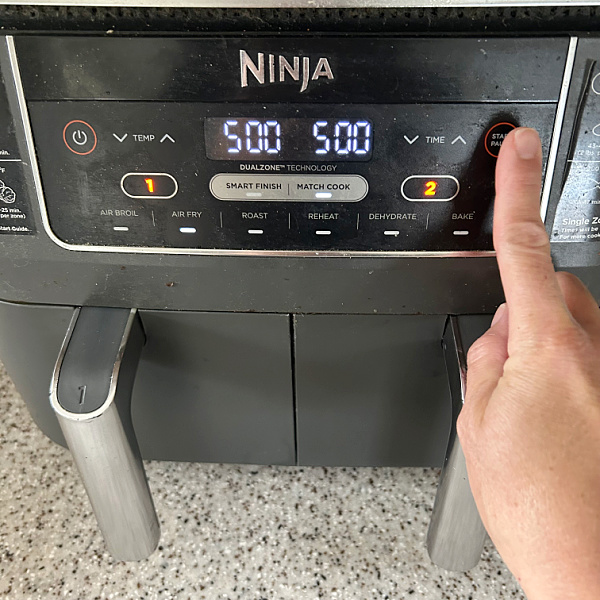 Setting Air Fryer to run for 5 minutes to clean