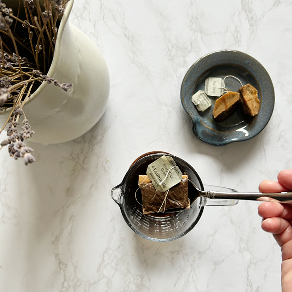 Removing tea bags from water