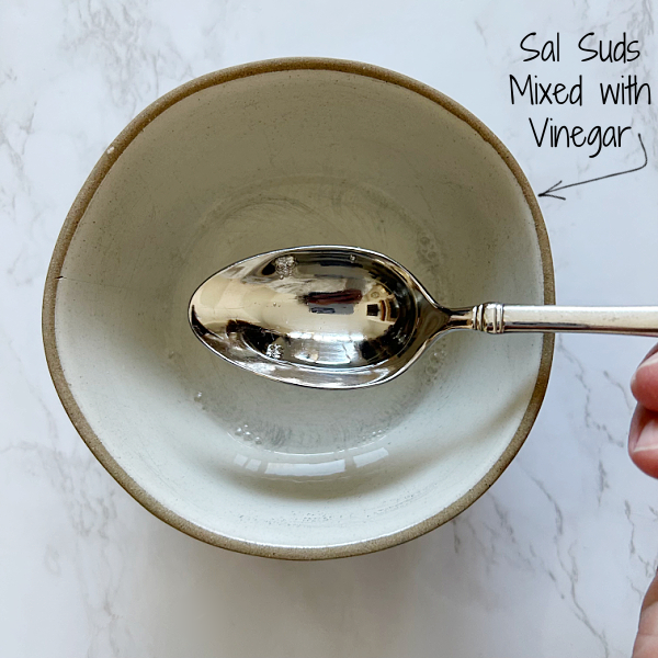 Sal Suds mixed with vinegar shows a clear liquid